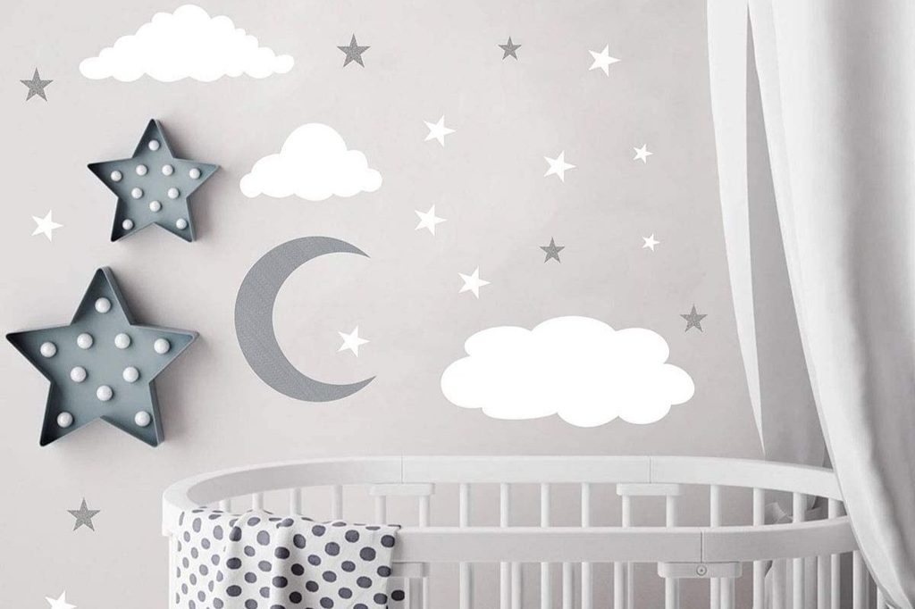 A nursery with moon and stars decorations.
