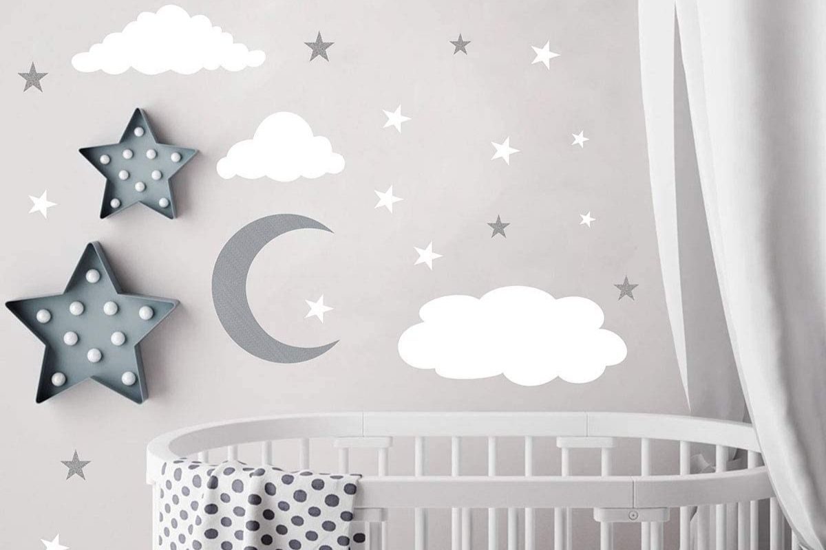 A nursery with moon and stars decorations.