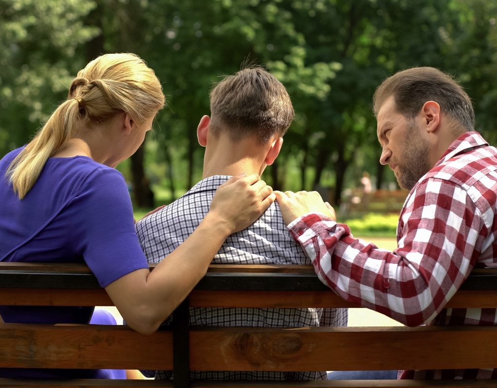 parents talking to teenager