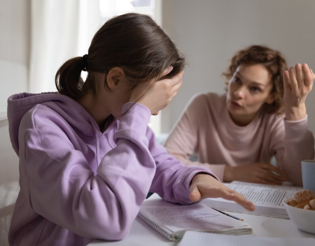 Teen daughter and mom talking