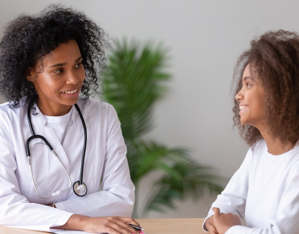 teen girl at doctor
