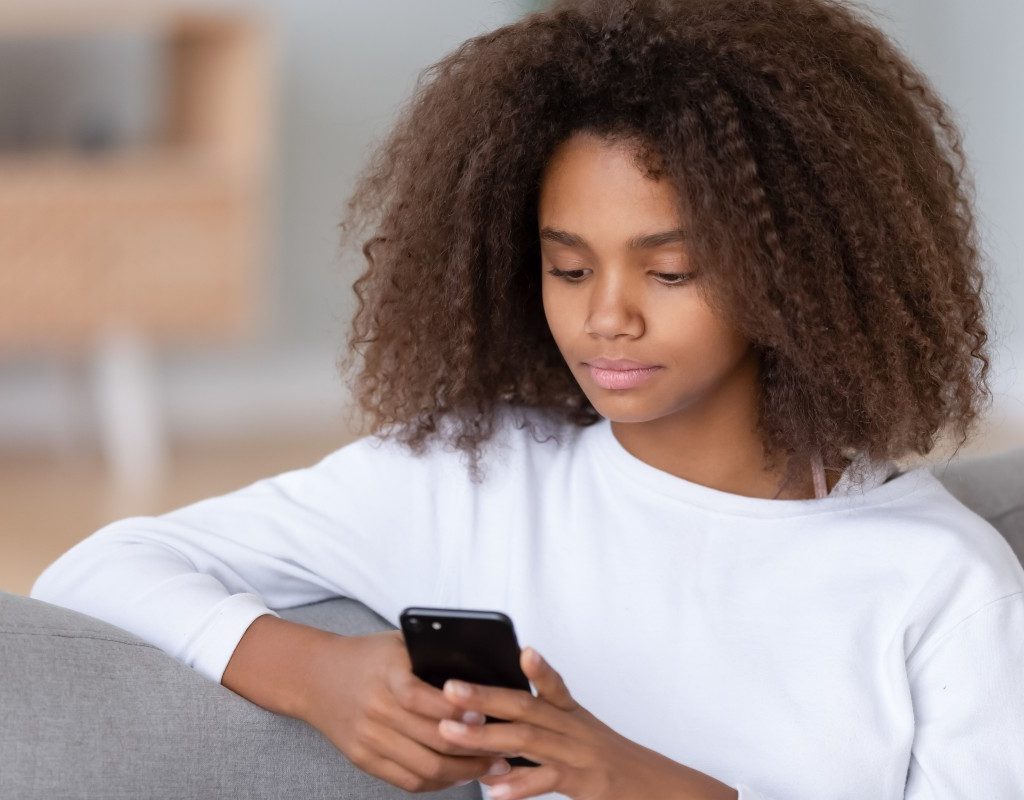 teenager on phone