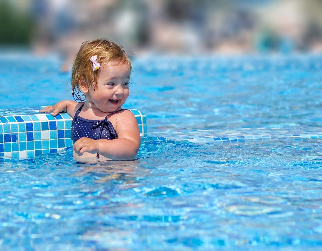 toddler in swimming pool