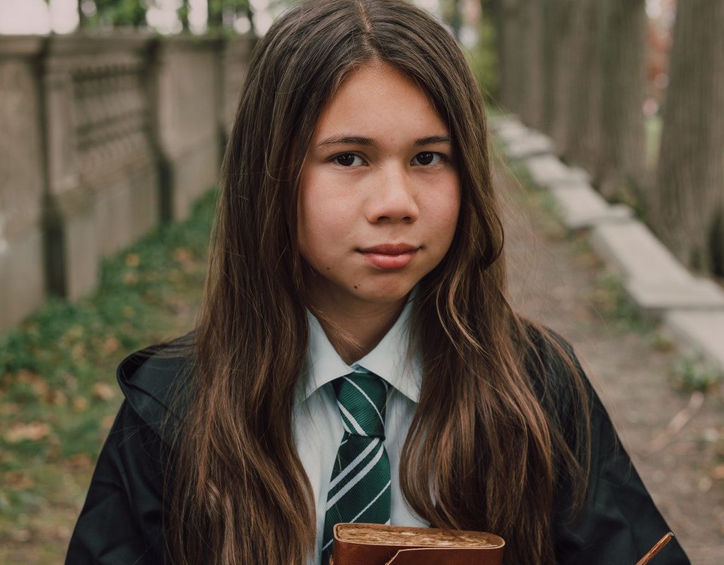 Tween girl in a Harry Potter costume
