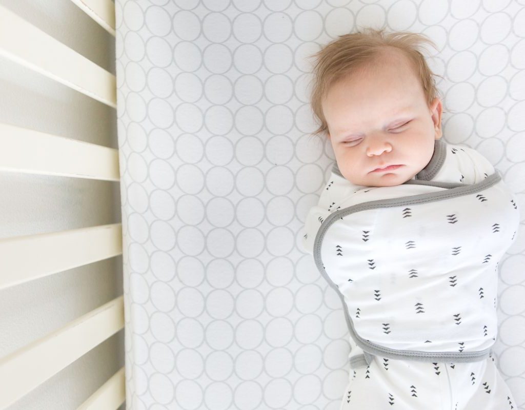 Baby In swaddle sleeping