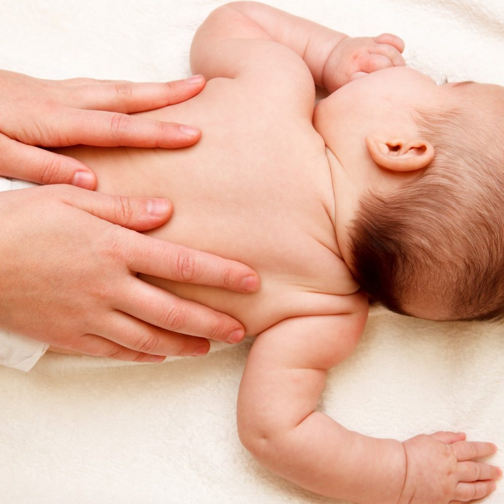 baby getting a massage to relieve colic