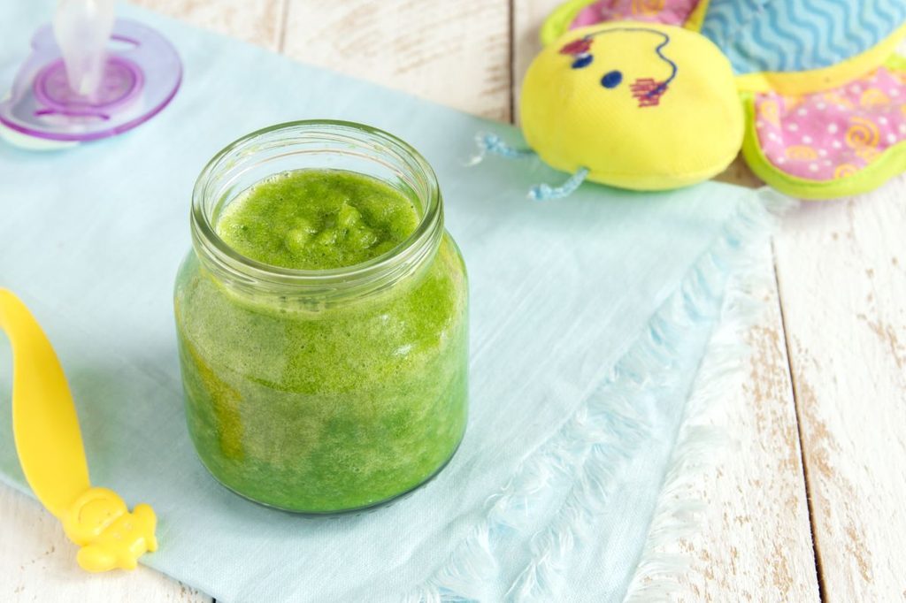 Spinach baby food in a jar.