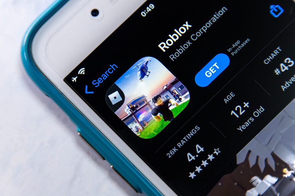The Roblox app about to be downloaded on a cell phone.