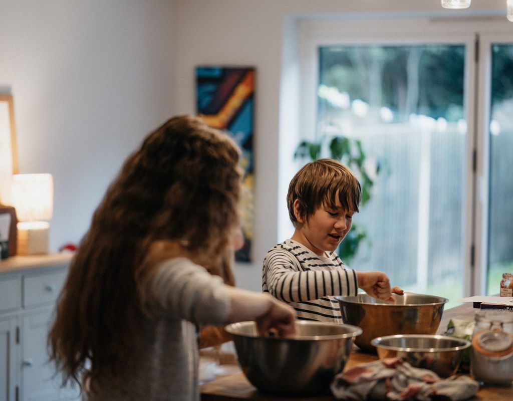 Kids mixing dough in the kitchen