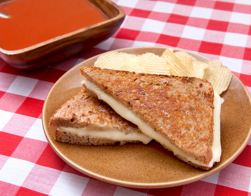 Plate of budget-friendly grilled cheese at a birthday party