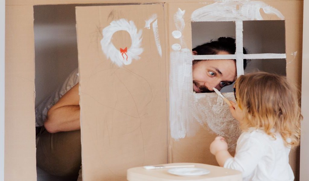 little girl painting play house
