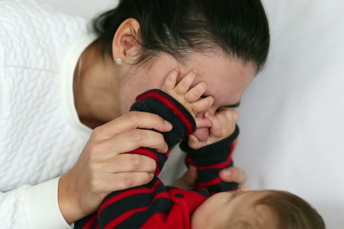 Playing peekaboo with baby