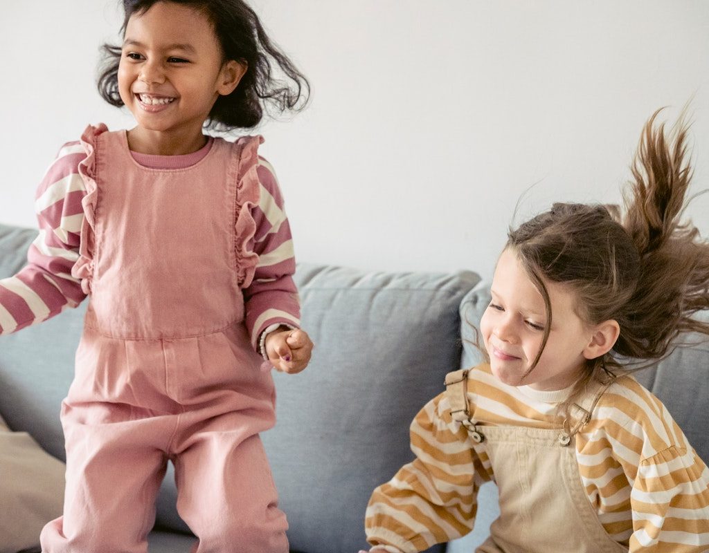 happy preschoolers jumping on an animal walk