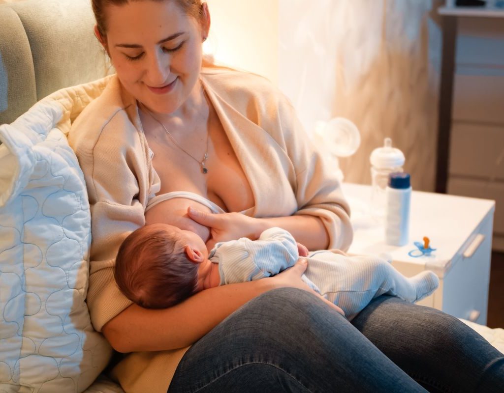Smiling Mom Breastfeeding