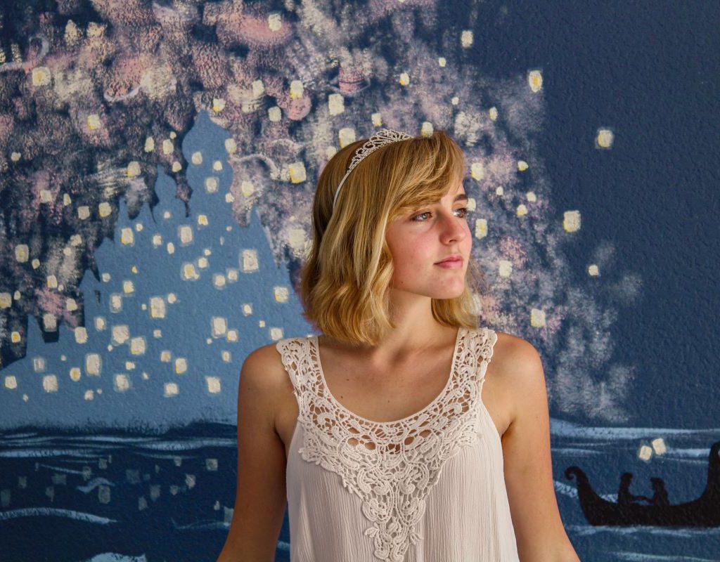 teen with tiara and lob