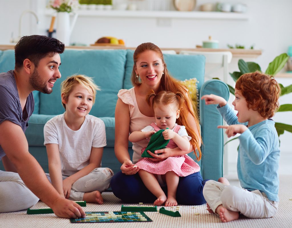 Family having fun playing word game together