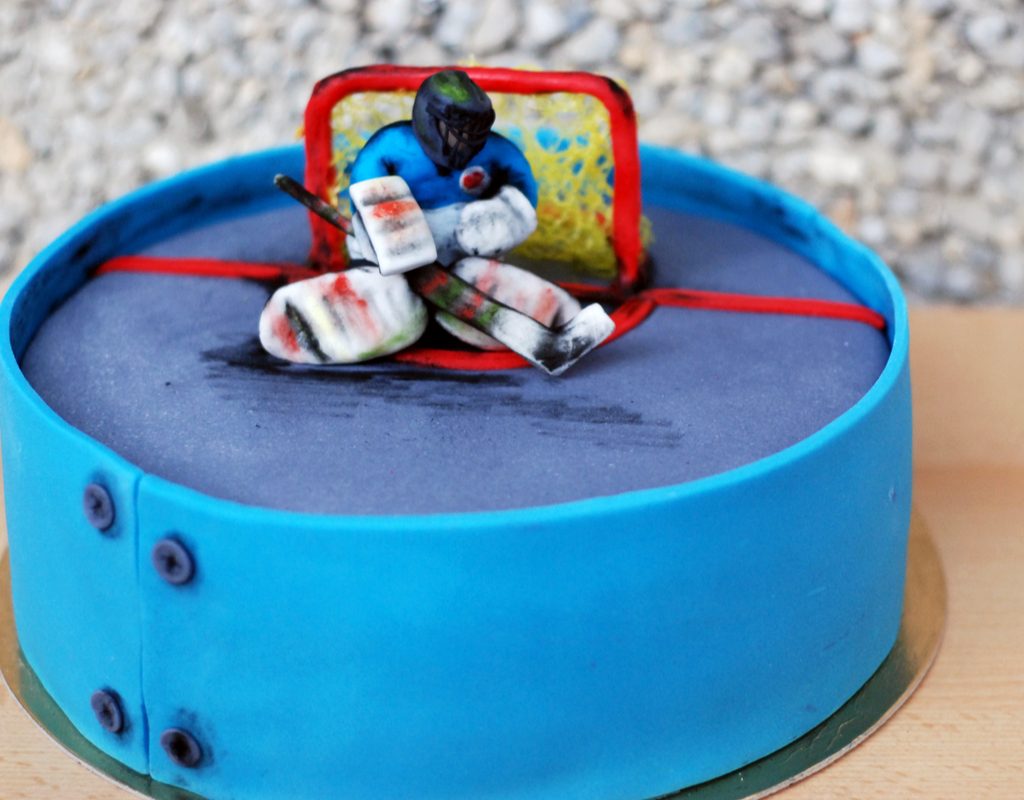 hockey birthday cake for a sports-themed birthday party
