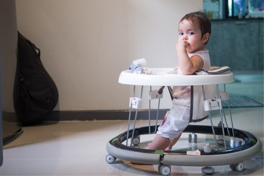 Infant in baby walker