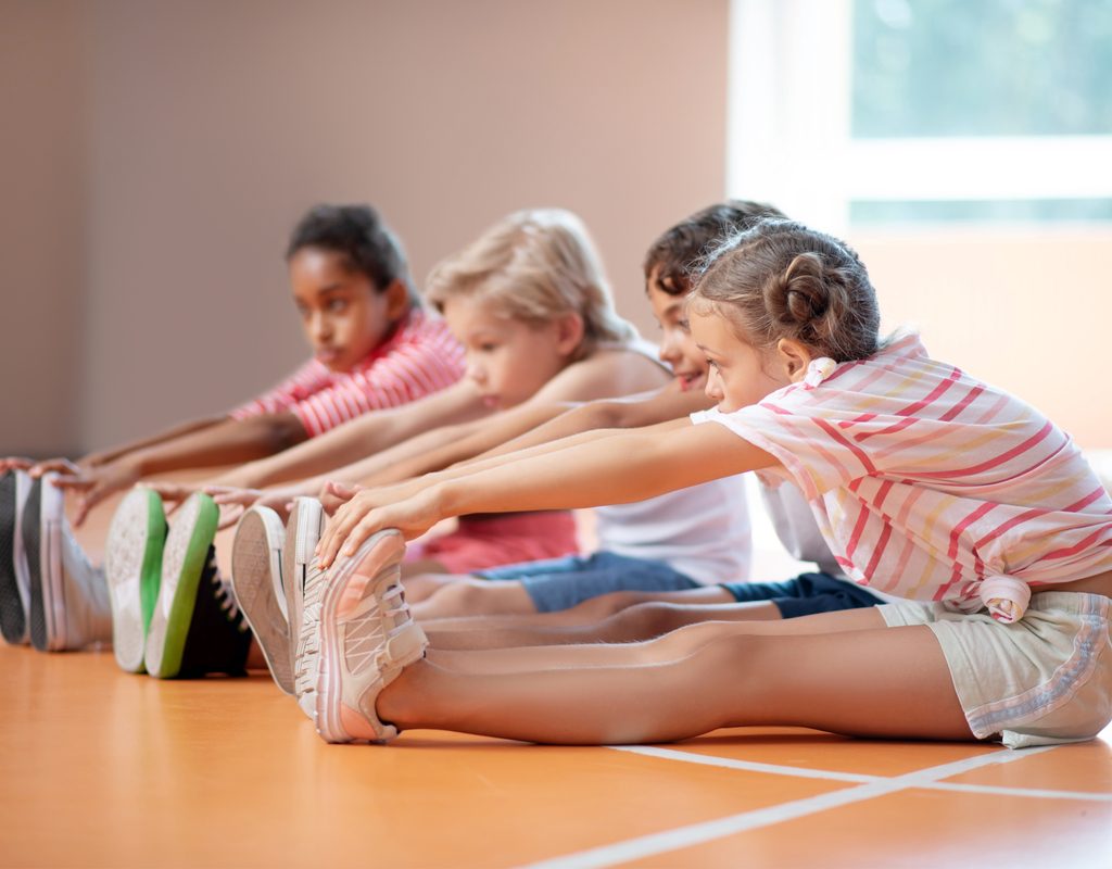 Girls doing warm-up exercises