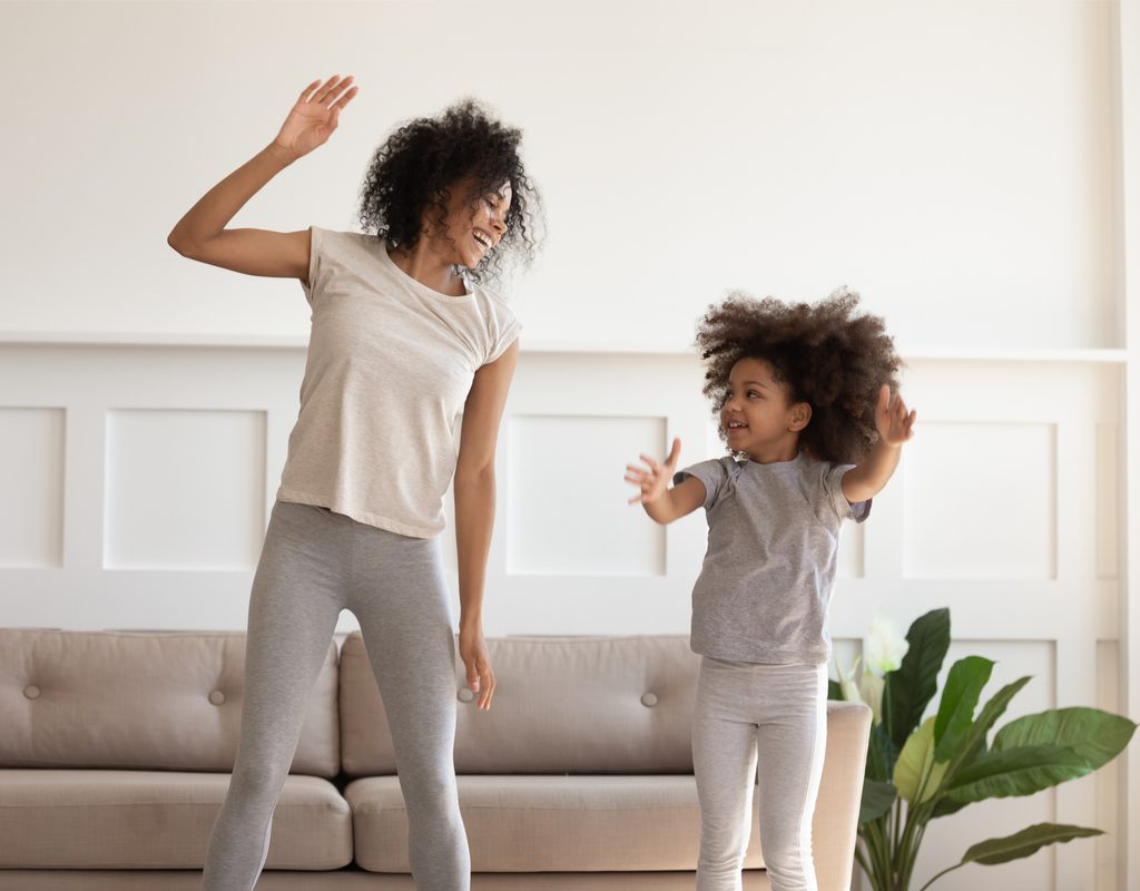 Mom and daughter playing musical game