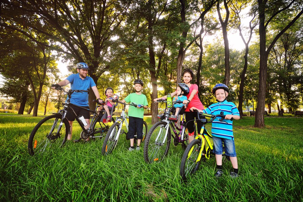 A family going on a bike ride.