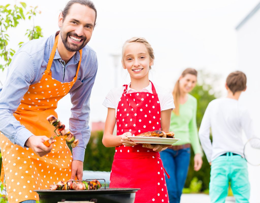 A family enjoying a cookout.