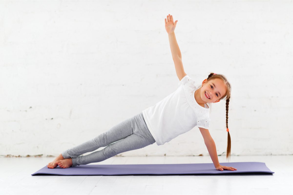 Young girl doing yoga