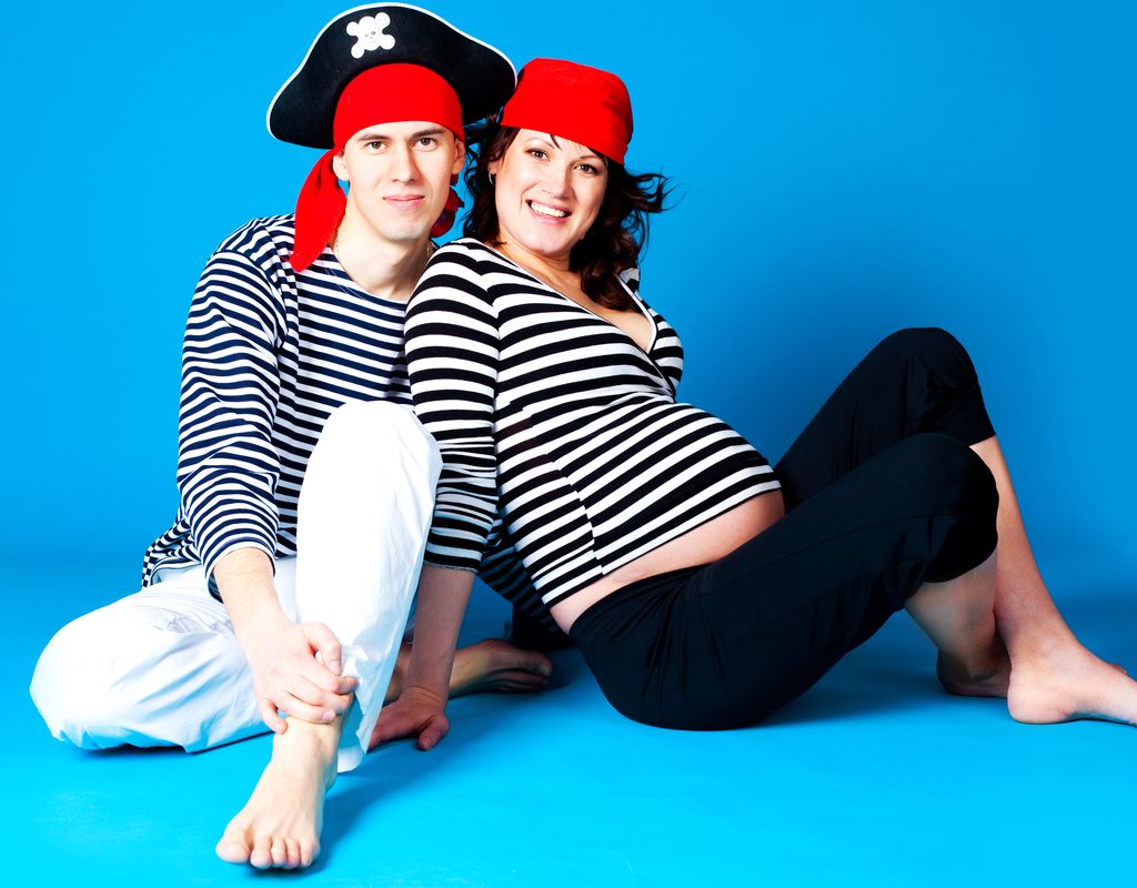 Expectant parents dressed as pirates for Halloween
