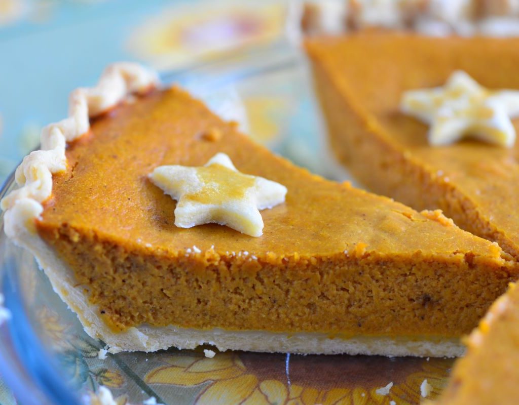 slices of pumpkin pie with a star on top