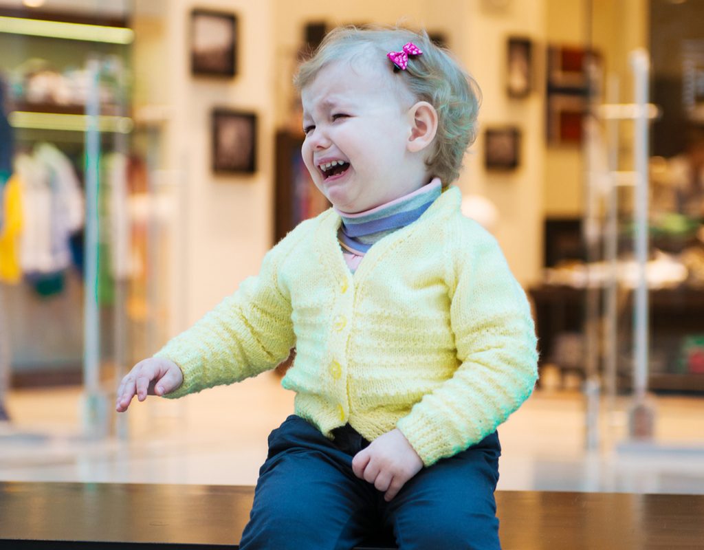 A toddler crying in a store.