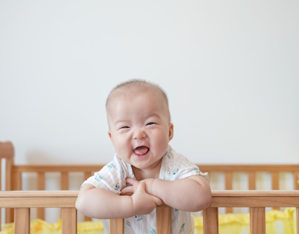 Baby Laughing In Crib