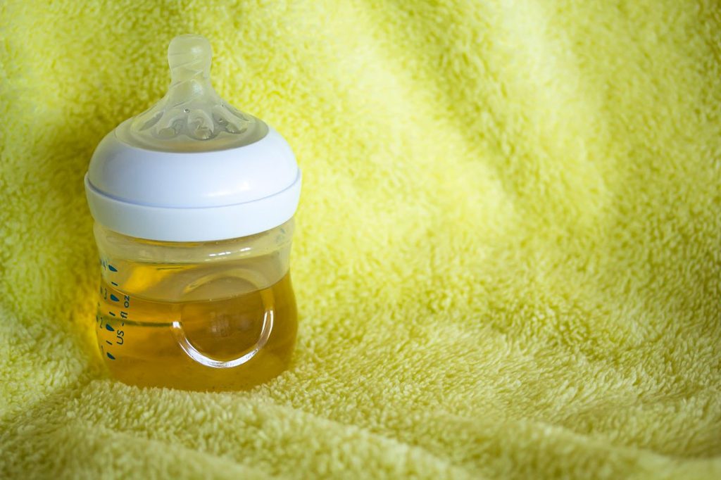 baby bottle filled with tea