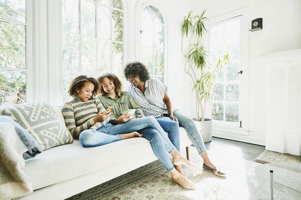 Family hanging out on the couch.