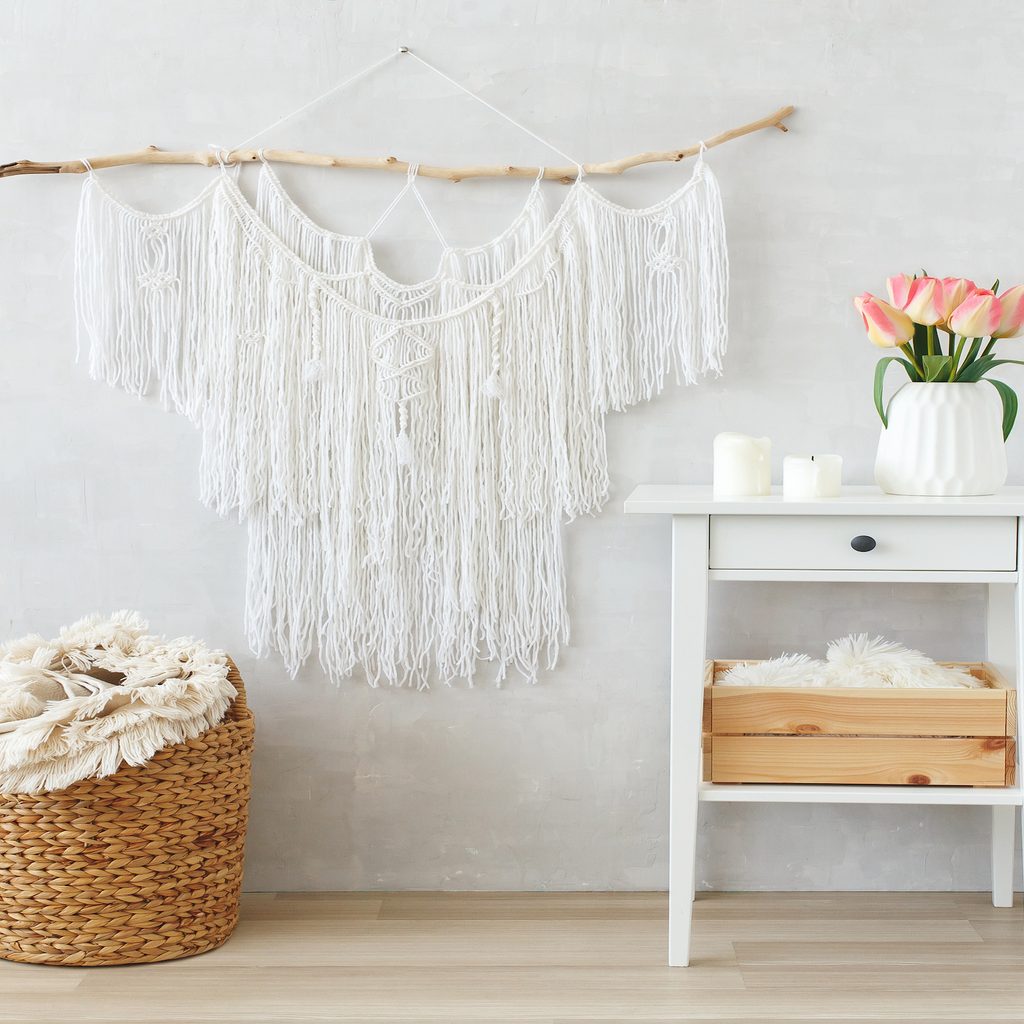macrame wall hanging and woven basket