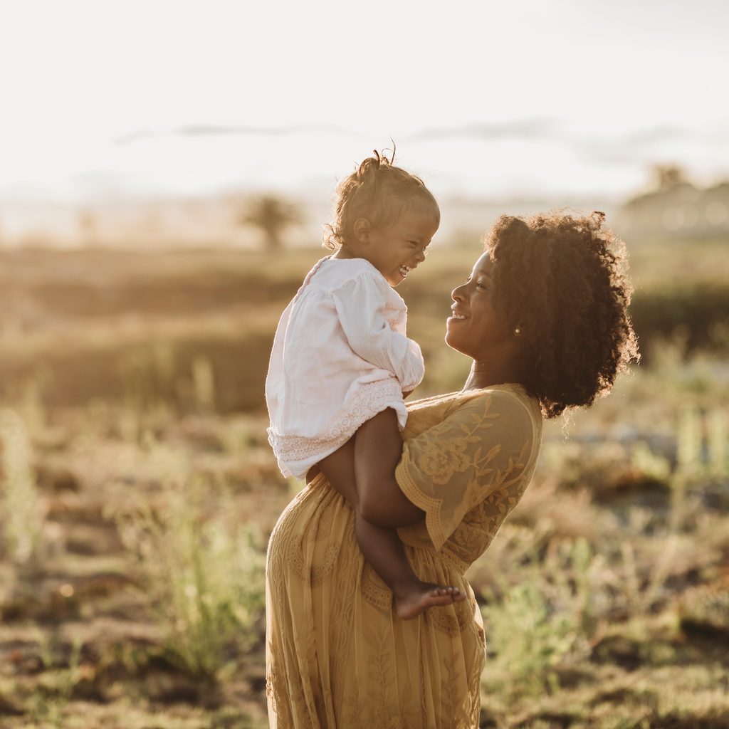 Pregnant Black mother and child