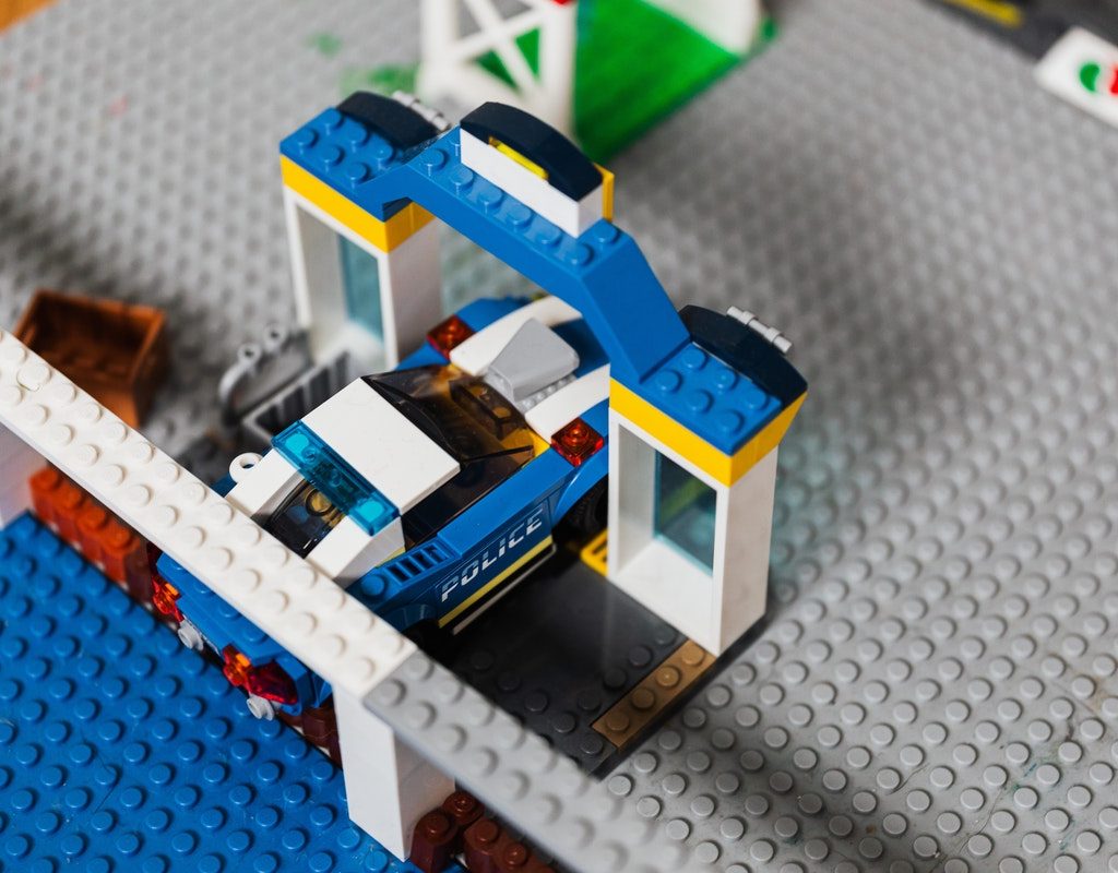 LEGO set with a police car in it.