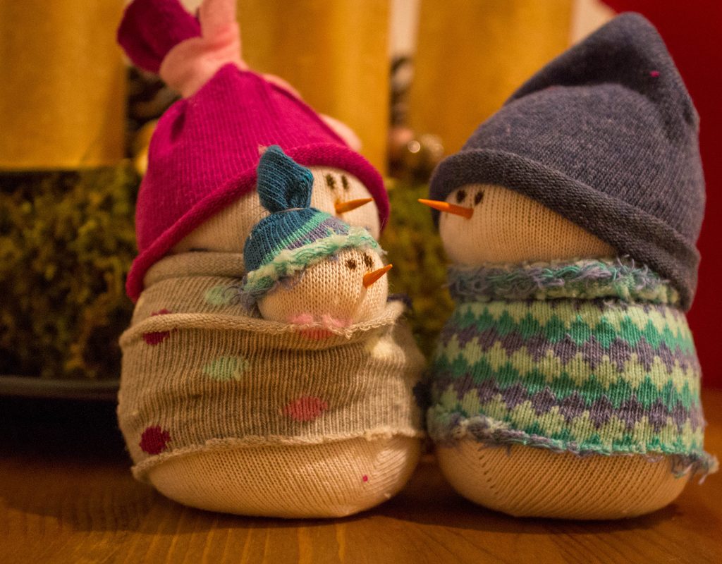 Felt toy snow family pieces.