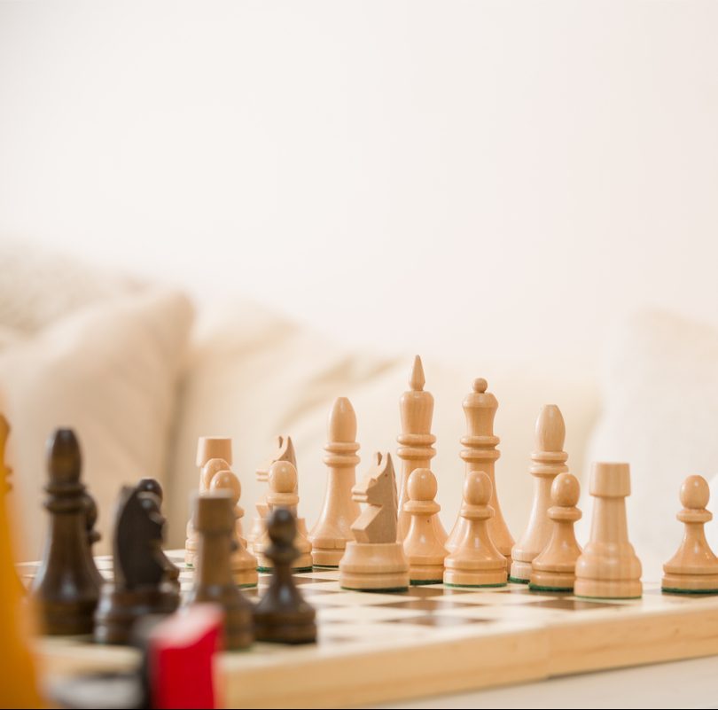 toddler learning how to play chess