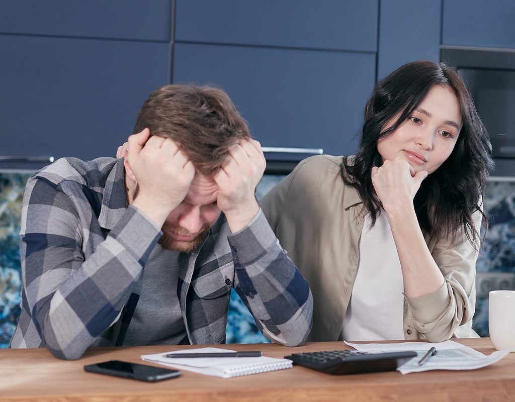 Couple worrying about finances