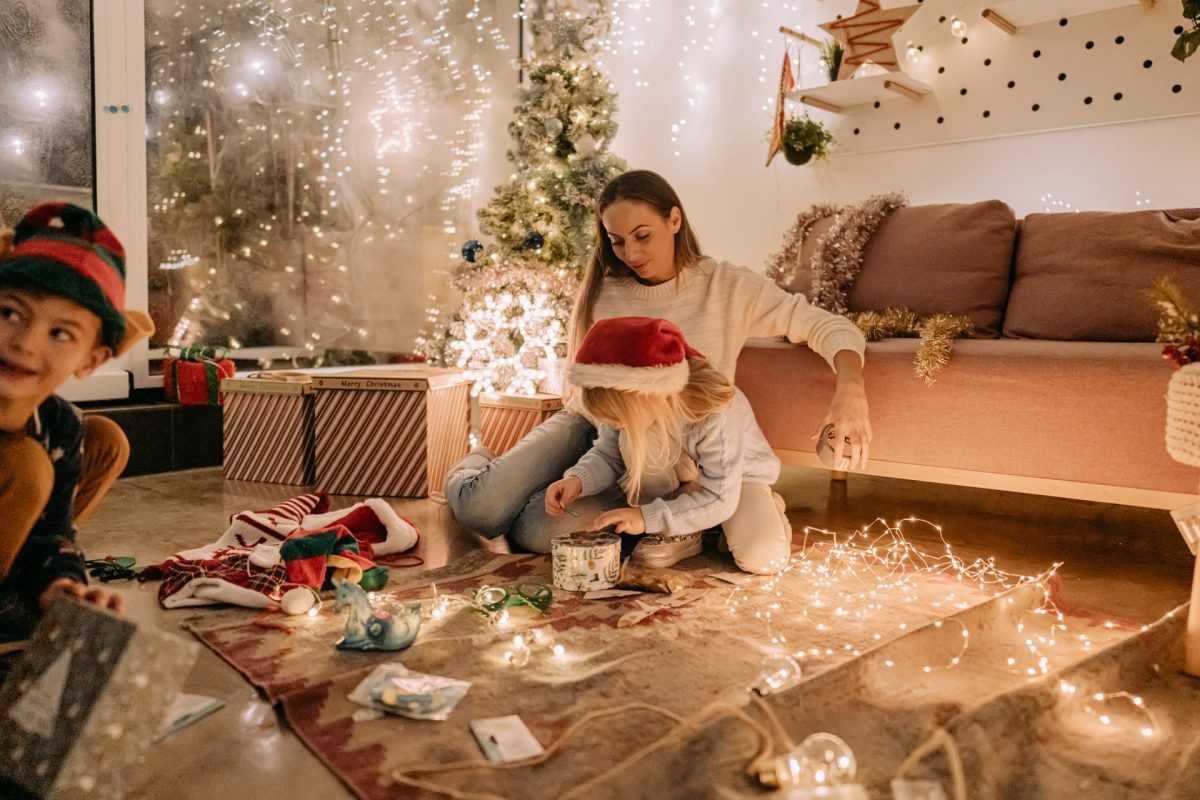 Mom and daughter making homemade Christmas ornaments