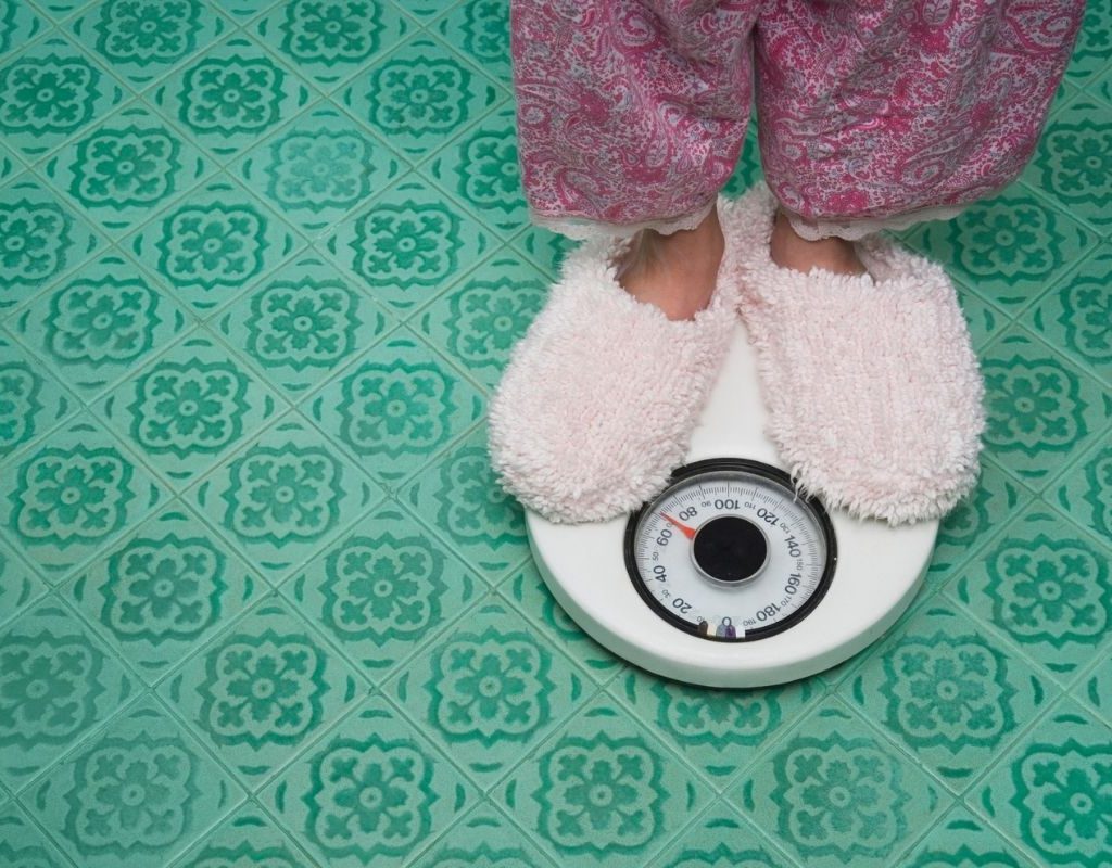 feet weighing on scale