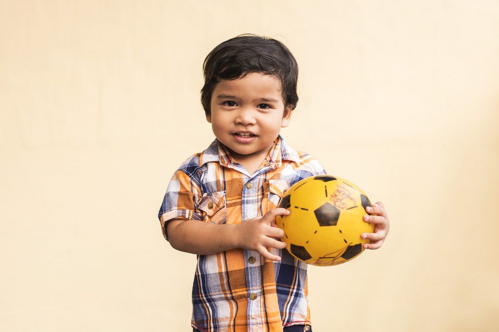 toddler-boy-holding-soccer-ball