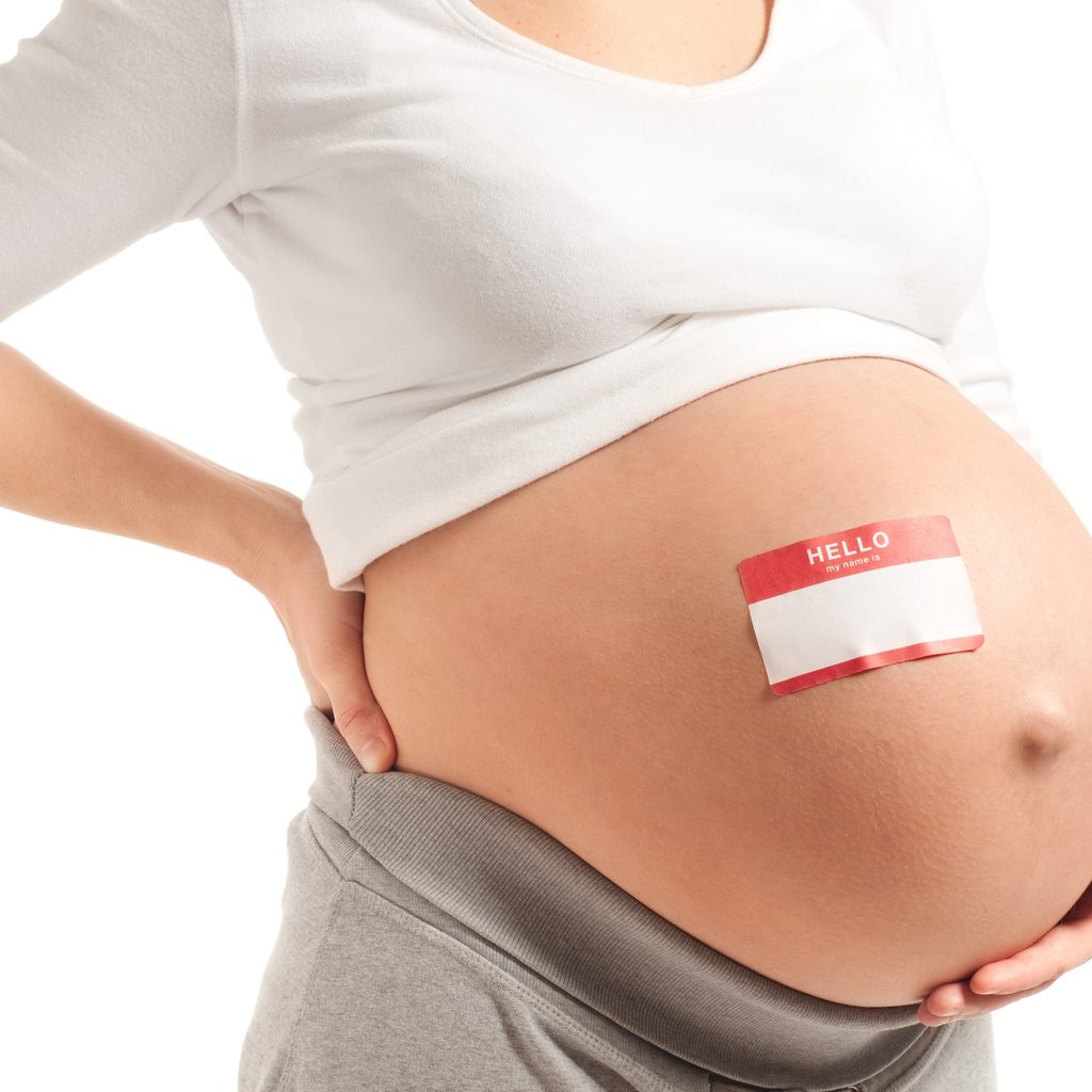Name tag on pregnant belly