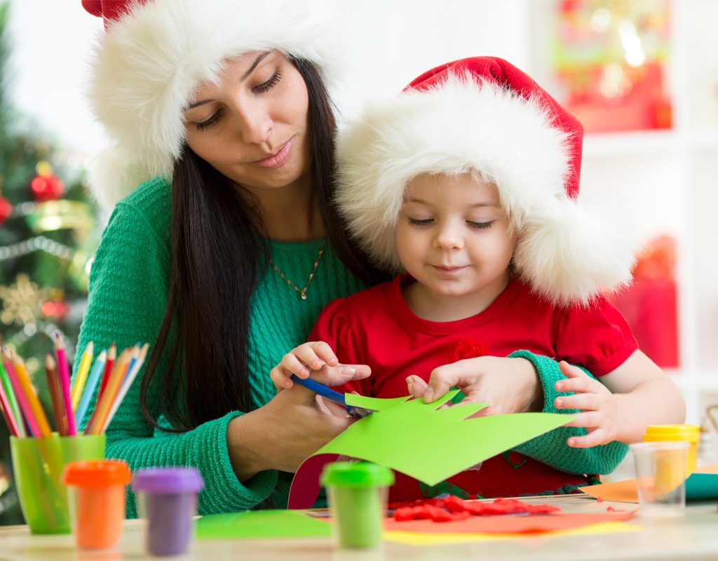 Mom and toddler doing holiday crafts