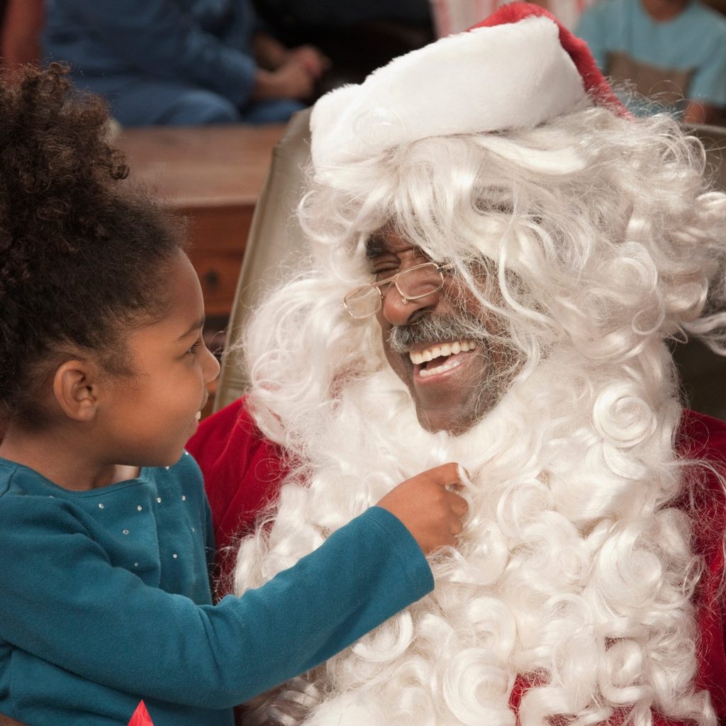 A child with Santa