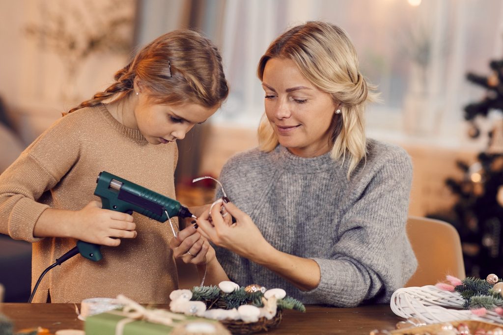Mom-and daughter making Christmas ornaments