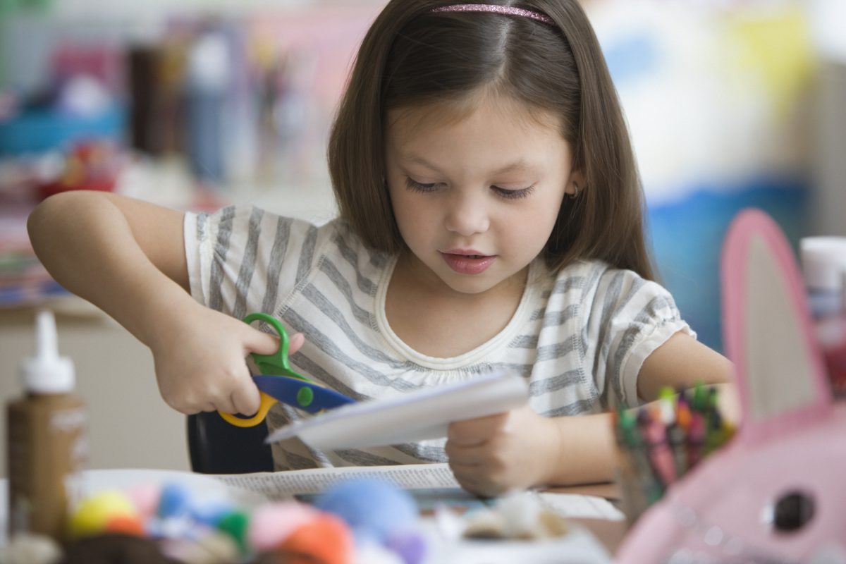 A child doing a craft