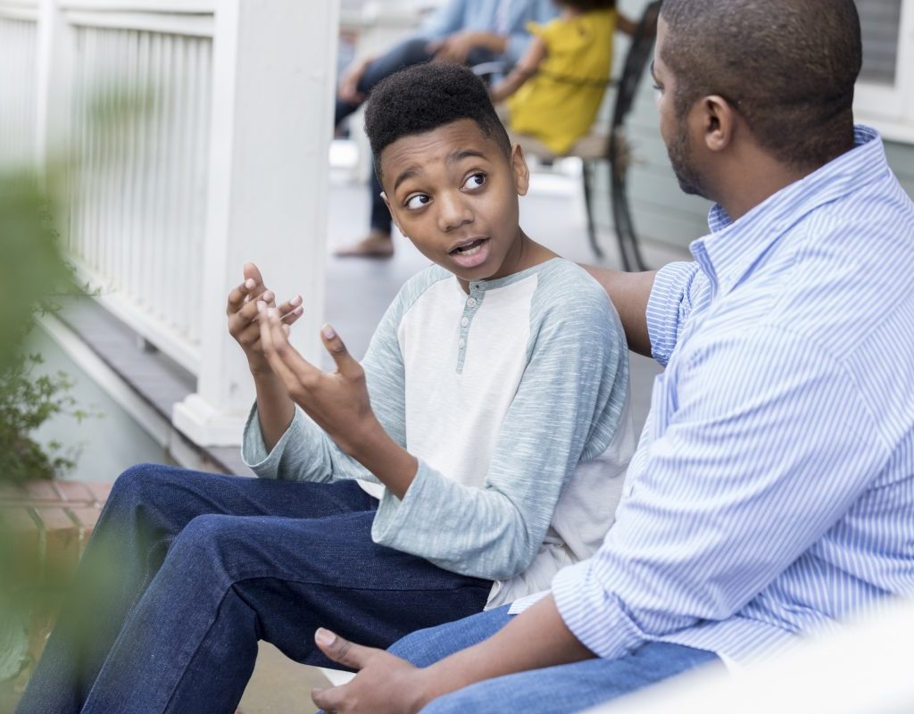Father and son having a discussion