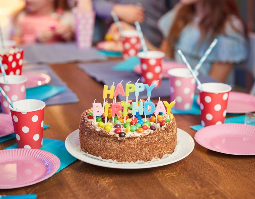 Delicious birthday cake with candles.