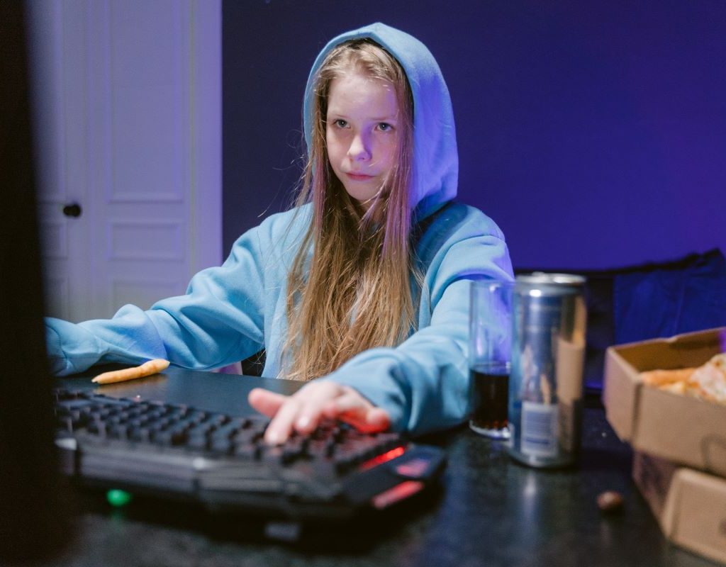Teen on keyboard late at night